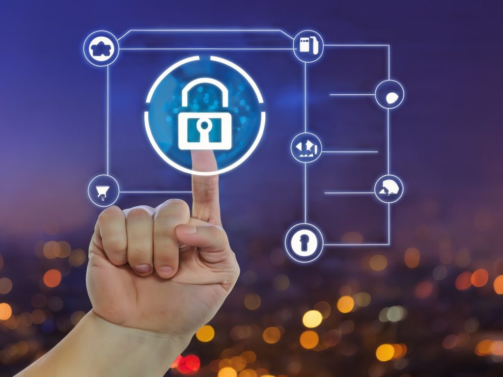 Information Assurance A finger pointing at a digital lock symbol with data icons in the background.